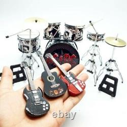 Miniature drum set plus guitars ACDC plus action figure Brian Johnson