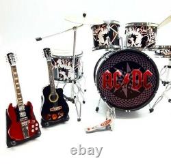 Miniature drum set plus guitars ACDC plus action figure Brian Johnson