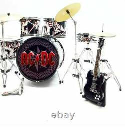 Miniature drum set plus guitars ACDC plus action figure Brian Johnson