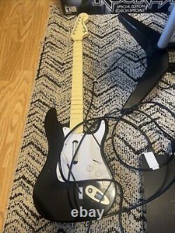 Dans la boîte Playstation 2 ou 3, batterie et guitare Rockband avec dongle, PS3 neuf PS2