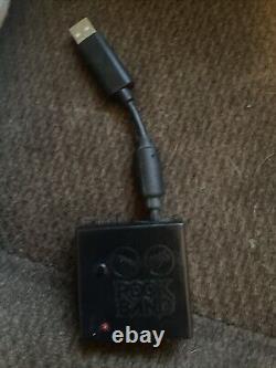 Dans la boîte Playstation 2 ou 3, batterie et guitare Rockband avec dongle, PS3 neuf PS2