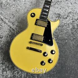 Gibson Custom Shop Limited Run 1974 Les Paul Vos Heavy Antique White Re459 translates to: Gibson Custom Shop Série Limitée 1974 Les Paul Vos Heavy Antique White Re459.