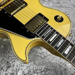 Gibson Custom Shop Limited Run 1974 Les Paul Vos Heavy Antique White Re459 translates to: Gibson Custom Shop Série Limitée 1974 Les Paul Vos Heavy Antique White Re459.