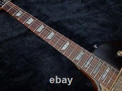 Gibson Les Paul Tribute Satin Tobacco Burst gaucher HH 3,84 kg avec GB d'occasion 2023