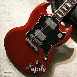Gibson Sg Standard Heritage Cherry #215920162 Yv139 translated in French is: Gibson Sg Standard Cerise Patrimoine #215920162 Yv139