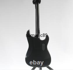 Guitare électrique ST gaucher en corps massif, noir, avec touche en palissandre - Ensemble