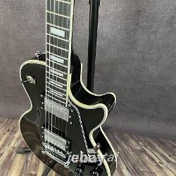 Guitare électrique noire sur mesure avec quincaillerie chromée 6 cordes Prise de vue réelle