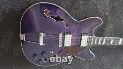 Guitare jazz électrique double cutaway couleur violet avec manche collé et incrustation de bloc