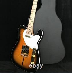 Magasin de guitares électriques Custom Shop Tuff Dog TL280 avec matériel doré et manche fixe en or.