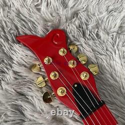 Une guitare électrique Red Prince sans marque avec matériel doré et ensemble de micros SH incrustés